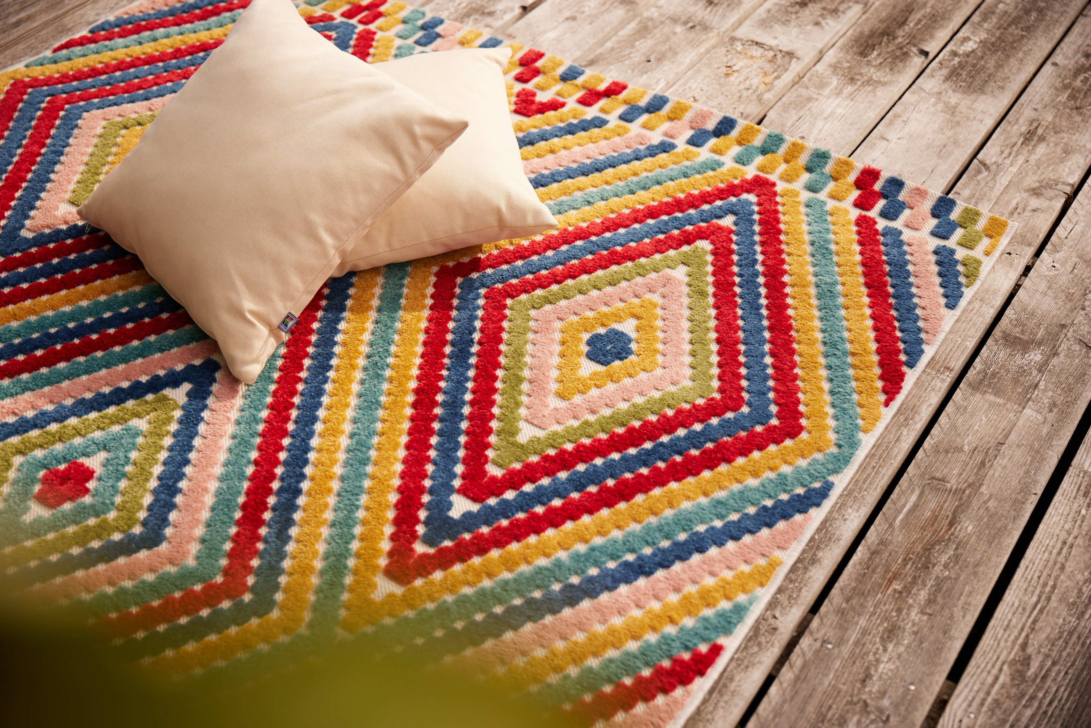 Tapis, coussins et plaids